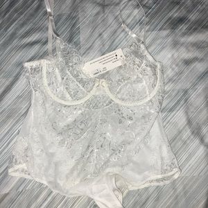 Sheer white bodysuit